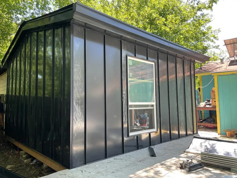 Black standing seam metal wall panels for Metal Roof Installation in Golden Valley